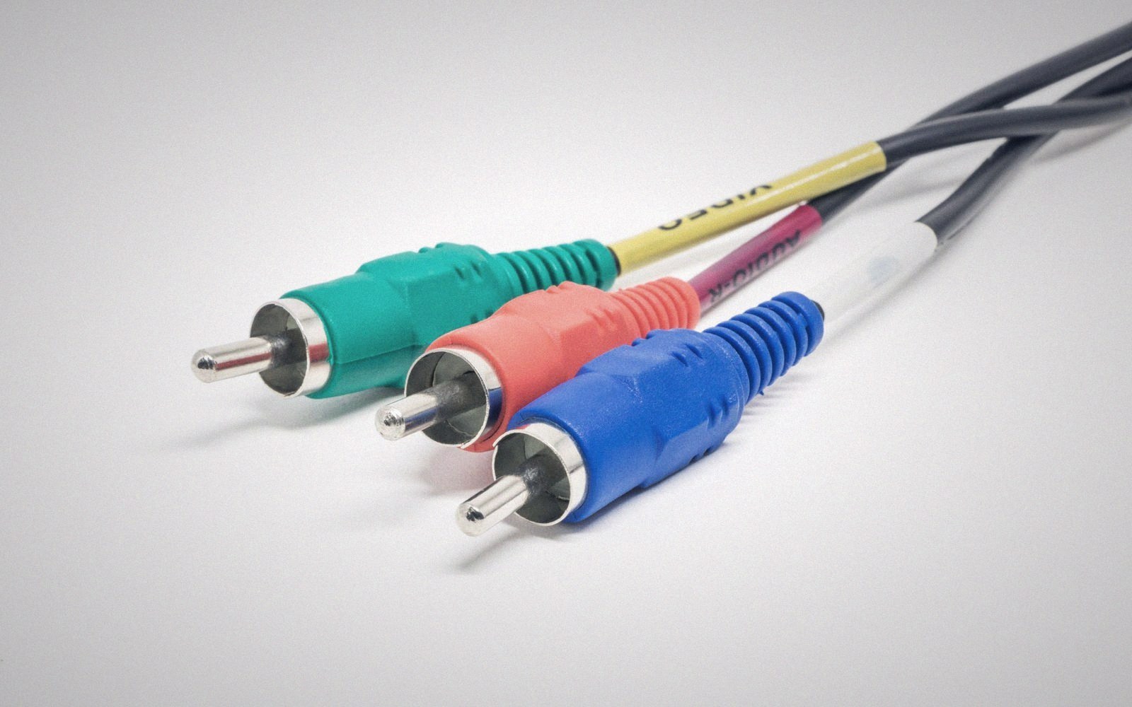 Green, red, and blue RCA cable connectors labeled for video and audio